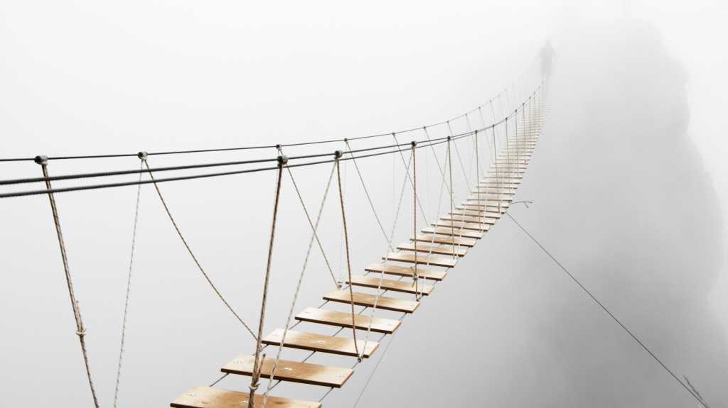 risk bridge into fog